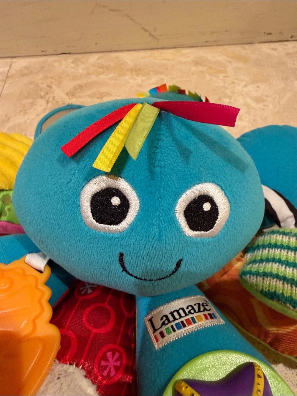 Lamaze Teal Octopus Sensory Plush with Multicolor Texture Petals
